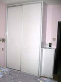 Двукрилен гардероб с плъзгащи врати